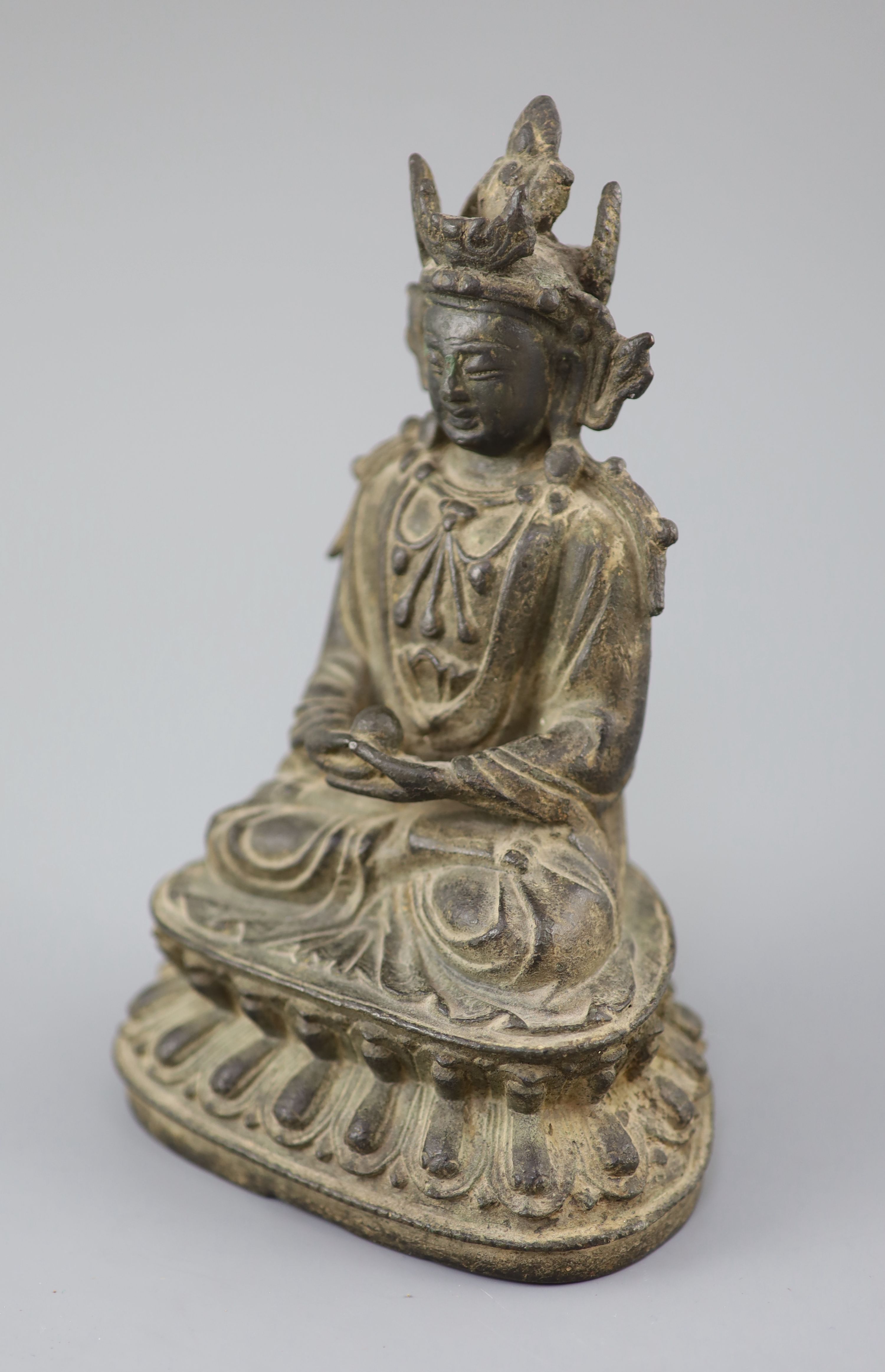A Chinese bronze figure Amitayus, 17th century, 20cm high, losses to crown